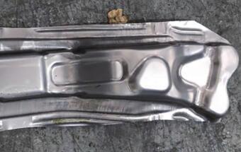 高强板结构件拉毛原因分析与解决方法